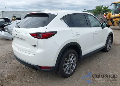 2021 Mazda Cx-5 Grand Touring Reserve z USA, uszkodzony, nr VIN JM3KFBAY9M0420344